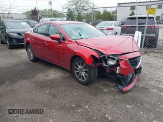2014 Mazda 6 i Touring with VIN JM1GJ1V69E1161978, listed as a IAAI auction lot 42166649 with 127,287 mi miles. Bid and sale history available at carsss.com. Image 1.
