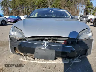 2013 Tesla Model S z VIN 5YJSA1DNXDFP04134, wystawiony jako Copart lot #87444944 z przebiegiem Nie podano mil oraz Czysty tytuł • Clean title. Historia ofert i sprzedaży dostępna na DreamBid. Obrazek 5.