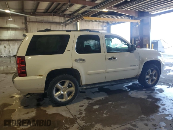 2007 Chevrolet Tahoe LTZ with VIN 1GNFK13007J313566, listed as a Copart auction lot 52498975 with 234,744 mi miles and Salvage title. Bid and sale history available at DreamBid. Image 3.