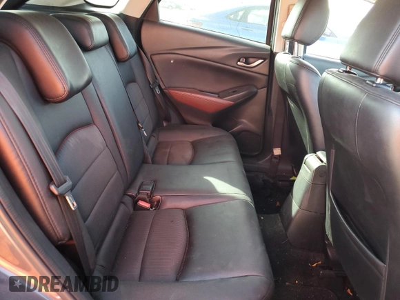 2017 Mazda CX-3 Touring z VIN JM1DKDC77H0151148, wystawiony jako Copart lot #81897434 z przebiegiem Nie podano mil oraz Szkoda całkowita • Salvage title. Historia ofert i sprzedaży dostępna na DreamBid. Obrazek 10.