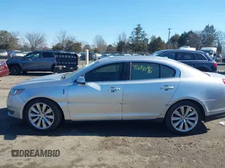 2013 Lincoln MKS EcoBoost with VIN 1LNHL9FT9DG613100, listed as a IAAI auction lot 41614096 with 207,789 mi miles. Bid and sale history available at carsss.com. Image 14.