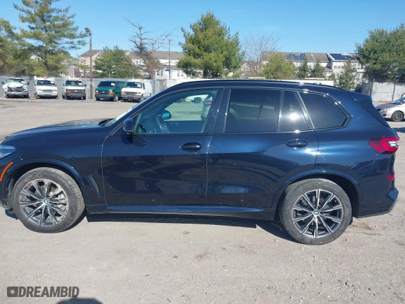 2021 BMW X5 xDrive40i with VIN 5UXCR6C09M9F83785, listed as a IAAI auction lot 41828697 with 57,863 mi miles. Bid and sale history available at carsss.com. Image 14.