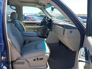 2004 Cadillac Escalade EXT z VIN 3GYEK62NX4G127782, wystawiony jako IAAI lot #42320908 z przebiegiem 271 625 mil mil oraz . Historia ofert i sprzedaży dostępna na DreamBid. Obrazek 5.