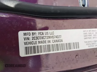 2021 Dodge Charger R/T with VIN 2C3CDXCT2MH574377, listed as a IAAI auction lot 42760667 with 49,295 mi miles and . Bid and sale history available at DreamBid. Image 9.