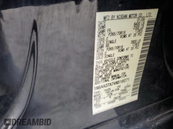 2004 Nissan Titan LE with VIN 1N6AA07A74N516071, listed as a Copart auction lot 87472284 with 140,011 mi miles and Salvage Title. Bid and sale history available at DreamBid. Image 14.