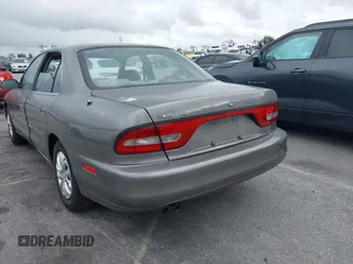 1994 Mitsubishi Galant ES with VIN 4A3AJ56G2RE073807, listed as a IAAI auction lot 41792108 with 167,271 mi miles. Bid and sale history available at carsss.com. Image 3.