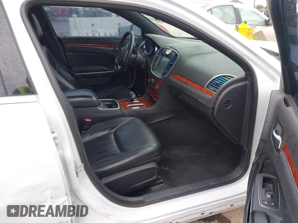 2014 Chrysler 300 with VIN 2C3CCAAG2EH235495, listed as a IAAI auction lot 41787801 with 142,354 mi miles and . Bid and sale history available at DreamBid. Image 5.