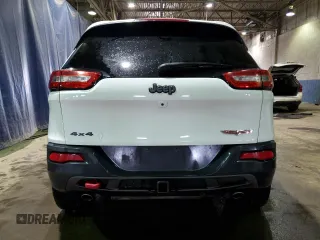 2015 Jeep Cherokee Trailhawk with VIN 1C4PJMBS7FW609741, listed as a Copart auction lot 55991595 with 125,711 mi miles and Clean title. Bid and sale history available at DreamBid. Image 6.