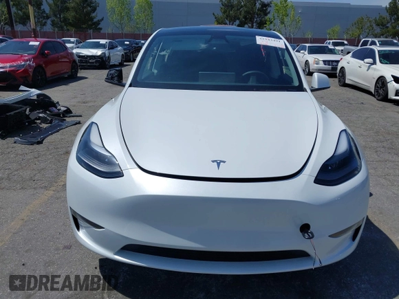 2023 Tesla Model Y Long Range with VIN 7SAYGAEE5PF855834, listed as a IAAI auction lot 41943491 with 34,480 mi miles. Bid and sale history available at carsss.com. Image 13.