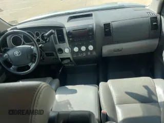 2012 Toyota Tundra z VIN 5TFRM5F10CX040423, wystawiony jako Copart lot #63373535 z przebiegiem 258 090 mil mil oraz Czysty tytuł • Clean title. Historia ofert i sprzedaży dostępna na DreamBid. Obrazek 9.