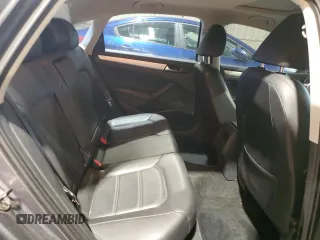 2012 Volkswagen Passat SE z VIN 1VWBP7A39CC080551, wystawiony jako Copart lot #57606895 z przebiegiem 154 965 mil mil oraz Czysty tytuł • Clean title. Historia ofert i sprzedaży dostępna na DreamBid. Obrazek 10.