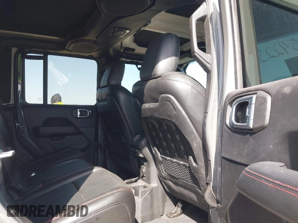 2022 Jeep Gladiator Rubicon z VIN 1C6JJTBG2NL167034, wystawiony jako IAAI lot #41854225 z przebiegiem Nie podano mil oraz . Historia ofert i sprzedaży dostępna na DreamBid. Obrazek 8.