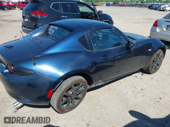 2021 Mazda MX-5 Miata Grand Touring with VIN JM1NDAM7XM0455743, listed as a IAAI auction lot 42067373 with 28,255 mi miles and . Bid and sale history available at DreamBid. Image 6.