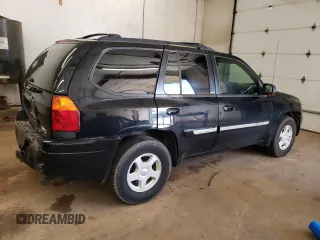 2003 GMC Envoy SLT with VIN 1GKDT13S732208692, listed as a Copart auction lot 67475514 with 243,146 mi miles and Salvage Title. Bid and sale history available at carsss.com. Image 3.