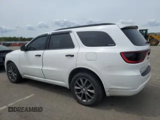 2018 Dodge Durango с VIN NY76958, выставлен на аукционе Copart как лот 55122245 с пробегом 102 413 миль миль и Списание • Salvage title. История ставок и продаж доступна на DreamBid. Изображение 2.