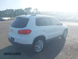 2014 Volkswagen Tiguan SE с VIN WVGAV3AX0EW598528, выставлен на аукционе IAAI как лот 42453851 с пробегом 141 869 миль миль и . История ставок и продаж доступна на DreamBid. Изображение 4.