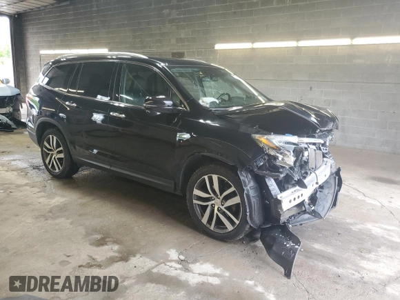 2017 Honda Pilot Touring z VIN 5FNYF6H91HB011030, wystawiony jako Copart lot #60236875 z przebiegiem 119 909 mil mil oraz Szkoda całkowita • Salvage title. Historia ofert i sprzedaży dostępna na DreamBid. Obrazek 4.