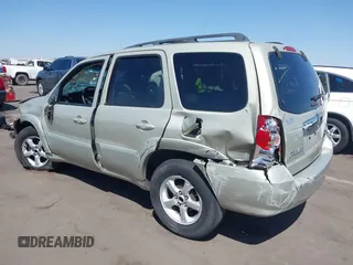 2005 Mazda Tribute i with VIN 4F2YZ02Z75KM56108, listed as a IAAI auction lot 42022864 with Not Provided miles and . Bid and sale history available at carsss.com. Image 3.