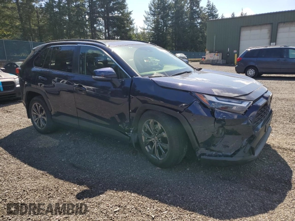 2024 Toyota RAV4 Hybrid XLE Premium with VIN JTMB6RFV7RD129471, listed as a Copart auction lot 53905745 with 8,869 mi miles and Salvage Title. Bid and sale history available at carsss.com. Image 4.