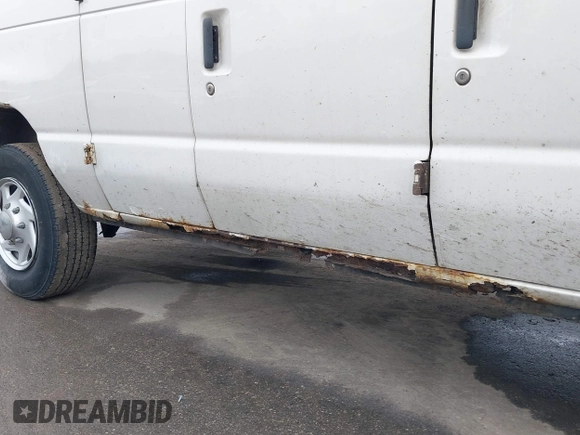 2005 Ford Econoline Cargo with VIN 1FTNE24W95HB25640, listed as a IAAI auction lot 41335337 with 183,045 mi miles. Bid and sale history available at carsss.com. Image 14.