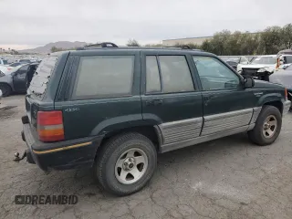 1993 Jeep Grand Cherokee Laredo with VIN 1J4GZ58S7PC125040, listed as a Copart auction lot 78846954 with 149,531 mi miles and Salvage Title. Bid and sale history available at carsss.com. Image 3.