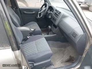 1999 Toyota RAV4 with VIN JT3HP10V8X7137998, listed as a IAAI auction lot 40954121 with 132,824 mi miles. Bid and sale history available at carsss.com. Image 5.