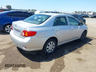 2010 Toyota Corolla with VIN 1NXBU4EE1AZ319230, listed as a IAAI auction lot 41988978 with 238,497 mi miles. Bid and sale history available at carsss.com. Image 4.