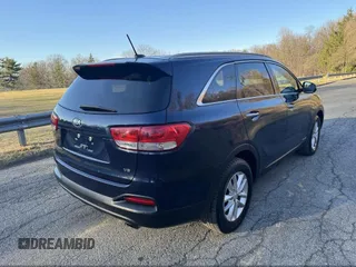 2016 Kia Sorento LX with VIN 5XYPGDA5XGG142632, listed as a IAAI auction lot 42143508 with 146,966 mi miles. Bid and sale history available at carsss.com. Image 4.