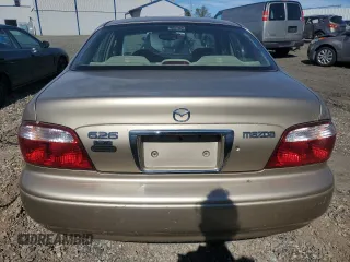 2001 Mazda 626 LX with VIN 1YVGF22C815231985, listed as a Copart auction lot 74913884 with 52,699 mi miles and Clean Title. Bid and sale history available at carsss.com. Image 6.