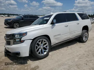 2016 Chevrolet Suburban LTZ with VIN 1GNSCJKC4GR325275, listed as a Copart auction lot 56185075 with 184,101 mi miles and Salvage title. Bid and sale history available at DreamBid. Image 1.