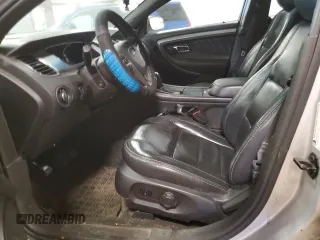 2013 Ford Taurus SEL z VIN 1FAHP2E82DG174647, wystawiony jako Copart lot #53784995 z przebiegiem Nie podano mil oraz Szkoda całkowita • Salvage title. Historia ofert i sprzedaży dostępna na DreamBid. Obrazek 7.