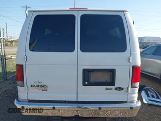 2014 Ford Econoline Wagon XL with VIN 1FBSS3BLXEDA86613, listed as a IAAI auction lot 41996263 with 238,848 mi miles. Bid and sale history available at carsss.com. Image 16.