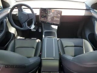 2022 Tesla Model Y Performance z VIN 7SAYGDEF2NF573979, wystawiony jako Copart lot #57778265 z przebiegiem 49 232 mil mil oraz Szkoda całkowita • Salvage title. Historia ofert i sprzedaży dostępna na DreamBid. Obrazek 8.