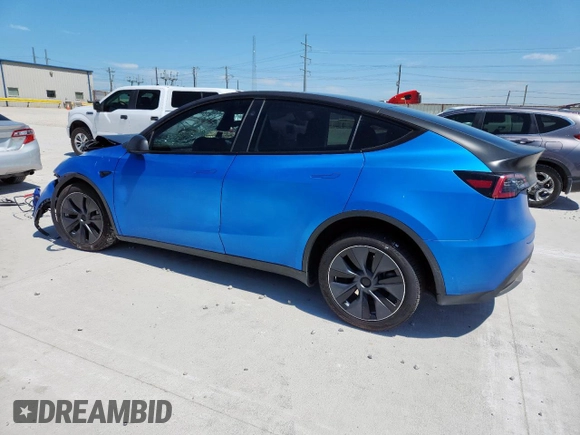 2024 Tesla Model Y Long Range z VIN 7SAYGDEE3RA238059, wystawiony jako Copart lot #61395925 z przebiegiem 14 991 mil mil oraz Szkoda całkowita • Salvage title. Historia ofert i sprzedaży dostępna na DreamBid. Obrazek 2.