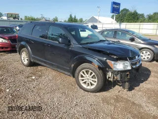 2017 Dodge Journey SXT with VIN 3C4PDDBG8HT525147, listed as a Copart auction lot 63270795 with 169,369 mi miles and Salvage title. Bid and sale history available at DreamBid. Image 4.