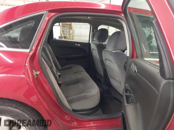 2014 Chevrolet Impala LT with VIN 2G1WB5E36E1133855, listed as a IAAI auction lot 41969358 with 148,897 mi miles and . Bid and sale history available at DreamBid. Image 8.