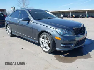 2014 Mercedes-Benz C-Class C 250 Sport with VIN WDDGF4HB8ER310657, listed as a IAAI auction lot 41556264 with 71,377 mi miles. Bid and sale history available at carsss.com. Image 1.