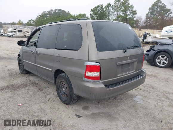 2005 Kia Sedona LX with VIN KNDUP132056674430, listed as a IAAI auction lot 41553321 with 136,734 mi miles. Bid and sale history available at carsss.com. Image 3.