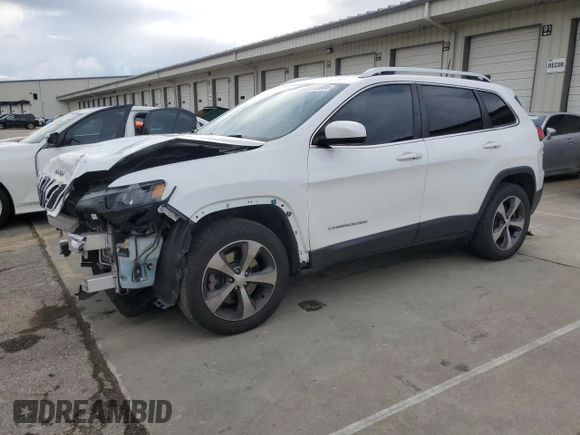 2019 Jeep Cherokee Limited with VIN 1C4PJMDX2KD409798, listed as a Copart auction lot 56913685 with 59,299 mi miles and Salvage title. Bid and sale history available at DreamBid. Image 1.
