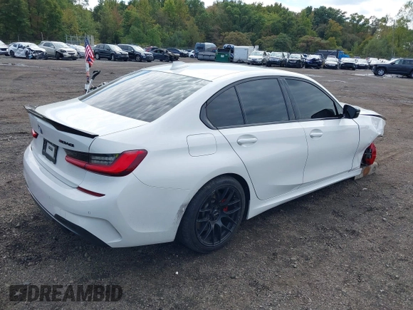 2021 BMW 3 Series M340i xDrive with VIN 3MW5U9J01M8B89618, listed as a IAAI auction lot 40473458 with 58,438 mi miles. Bid and sale history available at carsss.com. Image 4.