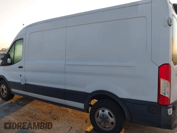 2020 Ford Transit z VIN 1FTBW9CG2LKA54526, wystawiony jako IAAI lot #42620417 z przebiegiem 131 084 mil mil oraz . Historia ofert i sprzedaży dostępna na DreamBid. Obrazek 14.