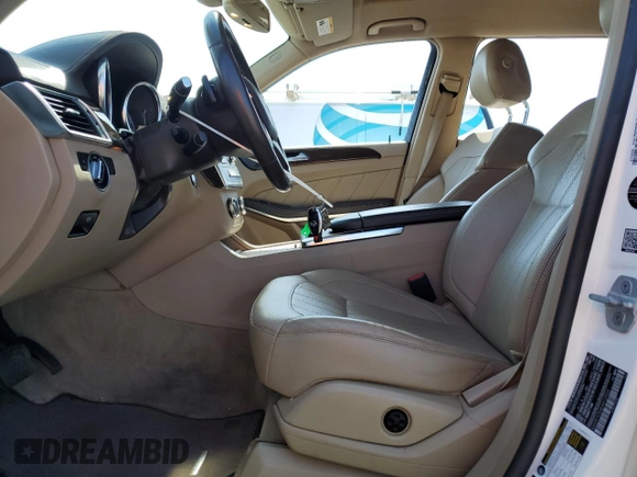 2014 Mercedes-Benz GL 450 with VIN 4JGDF7CEXEA412925, listed as a Copart auction lot 62164305 with 123,982 mi miles and Clean title. Bid and sale history available at DreamBid. Image 7.