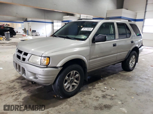 2004 Isuzu Rodeo S z VIN 4S2CK58W144306785, wystawiony jako Copart lot #85124684 z przebiegiem 296 433 mil mil oraz Szkody całkowita. Historia ofert i sprzedaży dostępna na DreamBid. Obrazek 1.