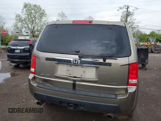 2011 Honda Pilot EX-L with VIN 5FNYF4H51BB076050, listed as a IAAI auction lot 42122883 with 143,288 mi miles and . Bid and sale history available at carsss.com. Image 17.