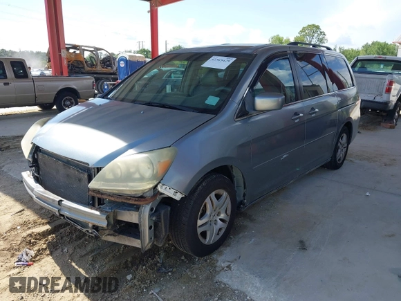2007 Honda Odyssey EX-L z VIN 5FNRL38657B116038, wystawiony jako IAAI lot #42365429 z przebiegiem 177 518 mil mil oraz . Historia ofert i sprzedaży dostępna na DreamBid. Obrazek 2.