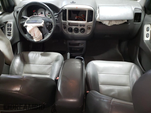 2004 Ford Escape XLT z VIN 1FMCU931X4KB36474, wystawiony jako Copart lot #52814635 z przebiegiem 168 550 mil mil oraz Szkoda całkowita • Salvage title. Historia ofert i sprzedaży dostępna na DreamBid. Obrazek 8.