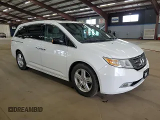 2011 Honda Odyssey Touring Elite with VIN 5FNRL5H90BB083092, listed as a Copart auction lot 54178785 with 135,765 mi miles and Salvage Title. Bid and sale history available at DreamBid. Image 4.