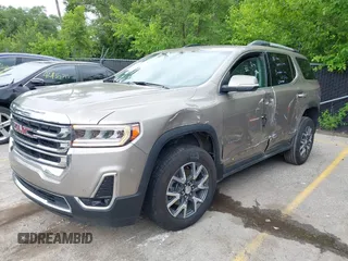 2023 GMC Acadia SLT with VIN 1GKKNUL41PZ184357, listed as a IAAI auction lot 42439400 with 60,238 mi miles and . Bid and sale history available at DreamBid. Image 2.
