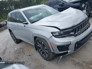 2022 Jeep Grand Cherokee Overland z VIN 1C4RJGDG2N8631233, wystawiony jako IAAI lot #41989881 z przebiegiem 74 150 mil mil oraz . Historia ofert i sprzedaży dostępna na DreamBid. Obrazek 1.