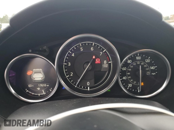 2022 Mazda MX-5 Miata Grand Touring z VIN JM1NDAM78N0504942, wystawiony jako Copart lot #83746334 z przebiegiem 17 610 mil mil oraz Szkoda całkowita • Salvage title. Historia ofert i sprzedaży dostępna na DreamBid. Obrazek 9.